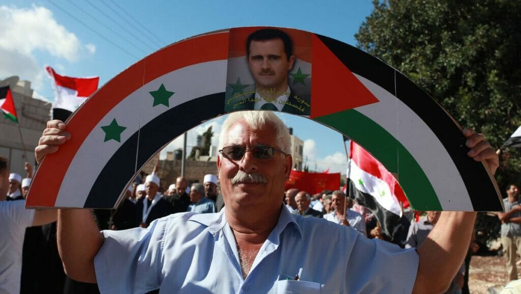 Palästinenser demonstrieren für den Syriens Präsidenten Assad