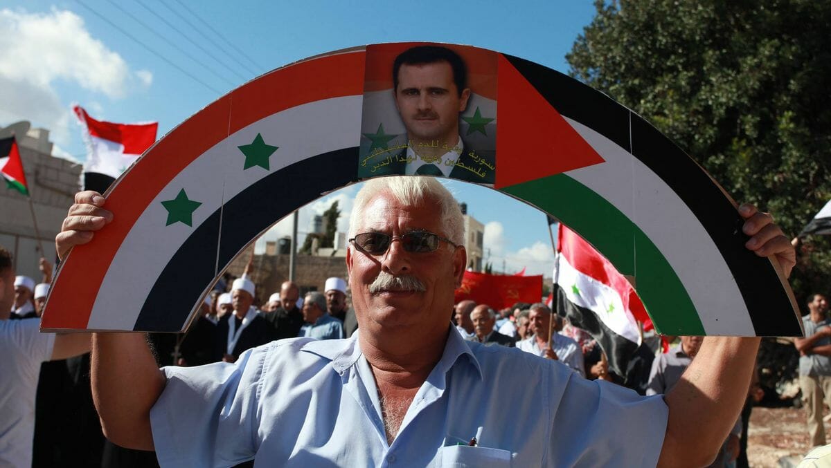 Palästinenser demonstrieren für den Syriens Präsidenten Assad