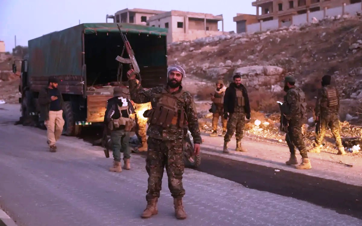 Islamistische Kämpfer gegen das Assad-Regime in Syrien. (© AP pic/CC BY 4.0)