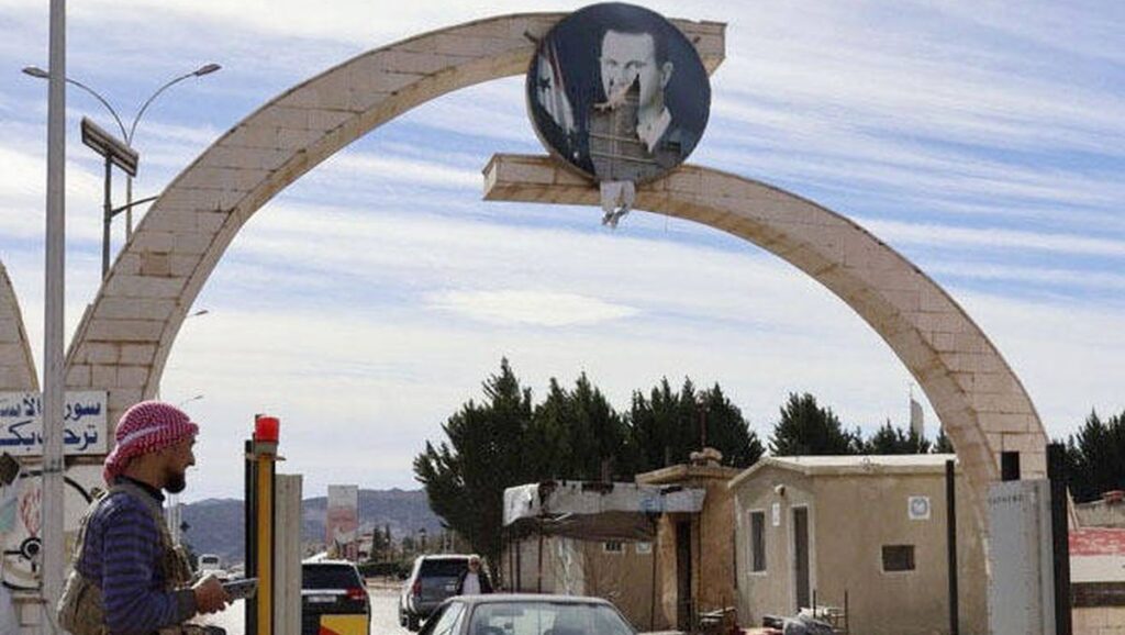 Der Nahe Osten ist nicht mehr derselbe: Beschädigtes Assad-Porträt an einem Grenzübergang zwischen Syrien und dem Libanon