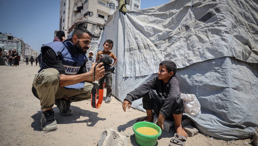 Medien bevorzugen Eindeutigkeit und Plakativität: Fotograf mit Kind in Gaza